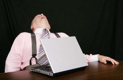 sleeping business man at his desk